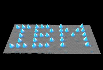 用stm移動氙原子排出的“ibm”圖案 用stm移動氙原子排出的“ibm”圖案